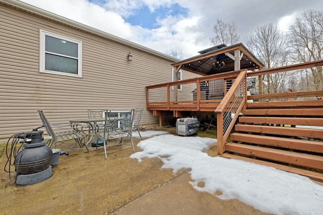 view of patio / terrace featuring stairway, outdoor dining space, and a deck