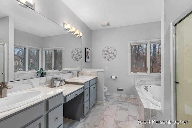 full bathroom with marble finish floor, double vanity, a sink, and visible vents