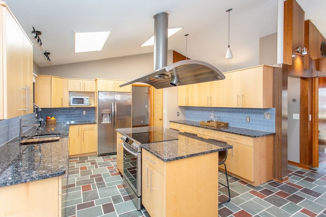 kitchen with island range hood, light brown cabinets, appliances with stainless steel finishes, and a sink