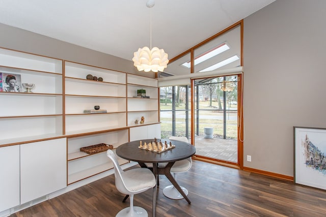 dining space with a notable chandelier, baseboards, vaulted ceiling, and dark wood-type flooring