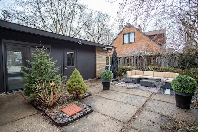 view of patio / terrace with fence and an outdoor living space