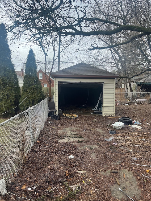 detached garage with fence