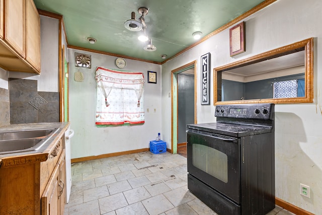 kitchen with baseboards, crown molding, decorative backsplash, and black electric range oven