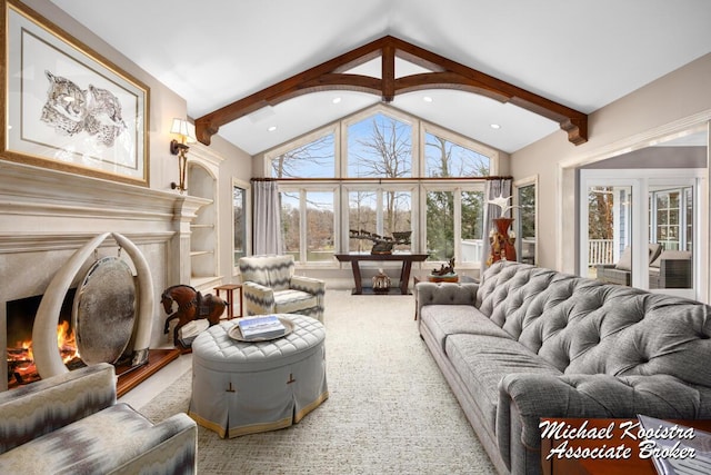 6862 Maplecrest Dr SE, Grand Rapids, MI 49546 - carpeted living room with high vaulted ceiling, a premium fireplace, beam ceiling, and recessed lighting
