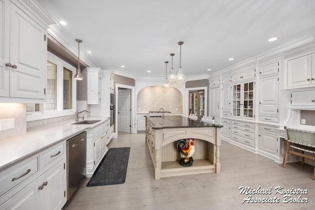6862 Maplecrest Dr SE, Grand Rapids, MI 49546 - kitchen featuring arched walkways, white cabinets, stainless steel dishwasher, open shelves, and a sink