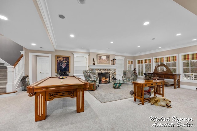 6862 Maplecrest Dr SE, Grand Rapids, MI 49546 - playroom featuring carpet floors, crown molding, and a stone fireplace