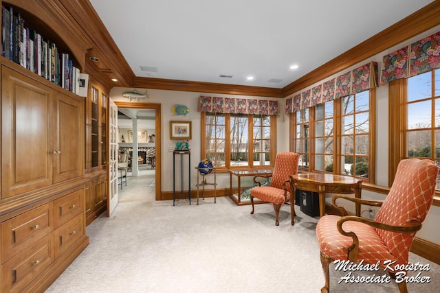 6862 Maplecrest Dr SE, Grand Rapids, MI 49546 - living area with crown molding, visible vents, light carpet, a lit fireplace, and baseboards