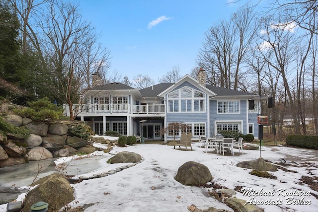 6862 Maplecrest Dr SE, Grand Rapids, MI 49546 - snow covered house with a chimney