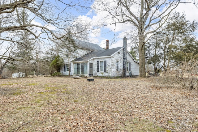 view of front of home with a chimney