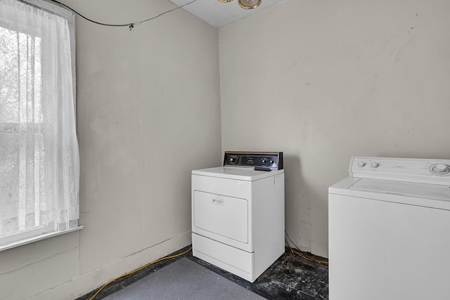 laundry area featuring laundry area and washing machine and clothes dryer