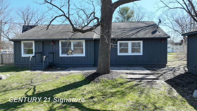 bungalow with a shingled roof