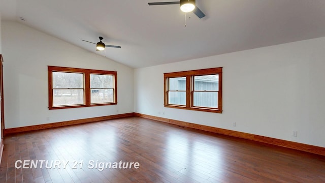 unfurnished room with a ceiling fan, vaulted ceiling, dark wood-style flooring, and baseboards