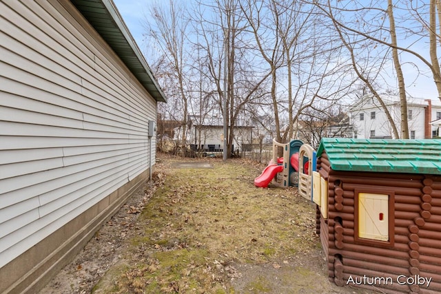 view of yard featuring a playground