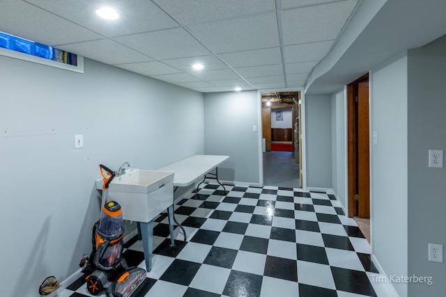 interior space with dark floors, recessed lighting, and baseboards