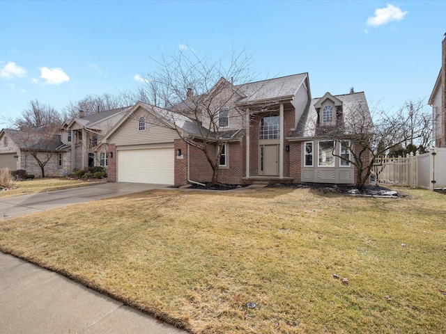 traditional home featuring concrete driveway, brick siding, fence, and a front lawn