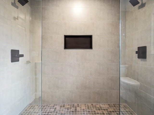 full bathroom with a tile shower