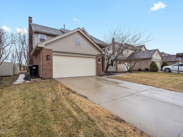 view of front of property with brick siding, a chimney, a front yard, a garage, and driveway