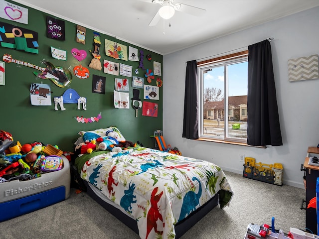 bedroom featuring a ceiling fan, carpet floors, and baseboards