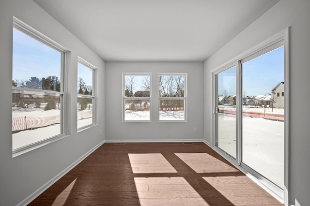 unfurnished sunroom with a healthy amount of sunlight