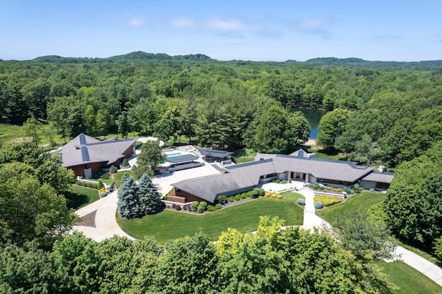 aerial view featuring a forest view