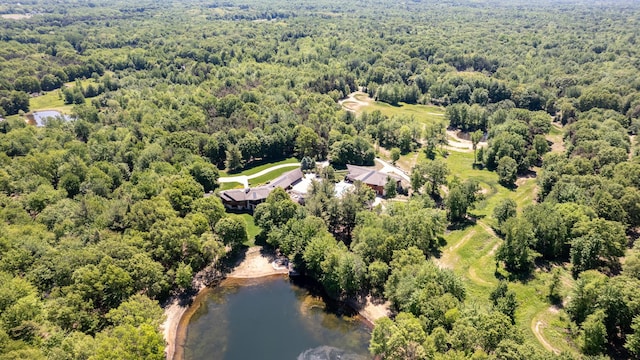 bird's eye view featuring a forest view