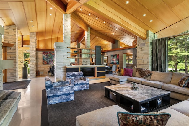 living area featuring high vaulted ceiling, wooden ceiling, and beam ceiling