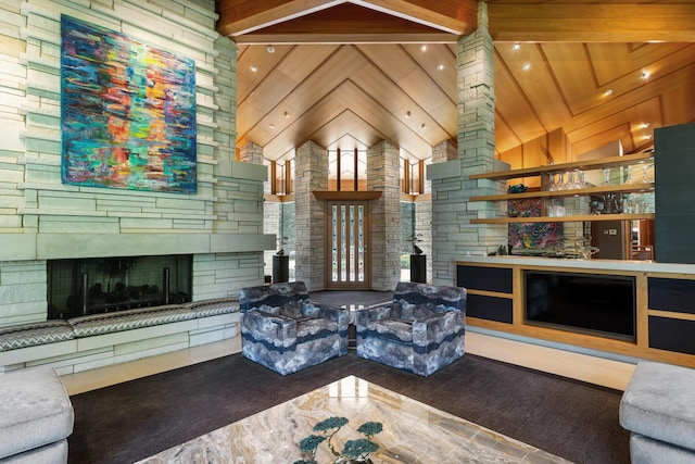 living room with high vaulted ceiling, carpet flooring, a fireplace, and beamed ceiling