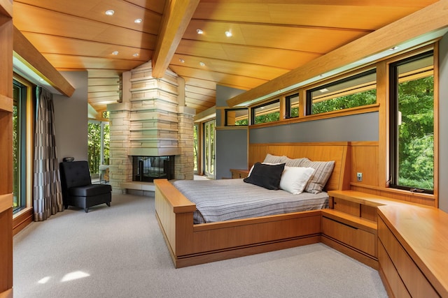 carpeted bedroom with recessed lighting, wooden ceiling, a stone fireplace, and lofted ceiling with beams