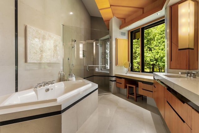 bathroom featuring visible vents, tile patterned floors, vanity, a shower stall, and a bath