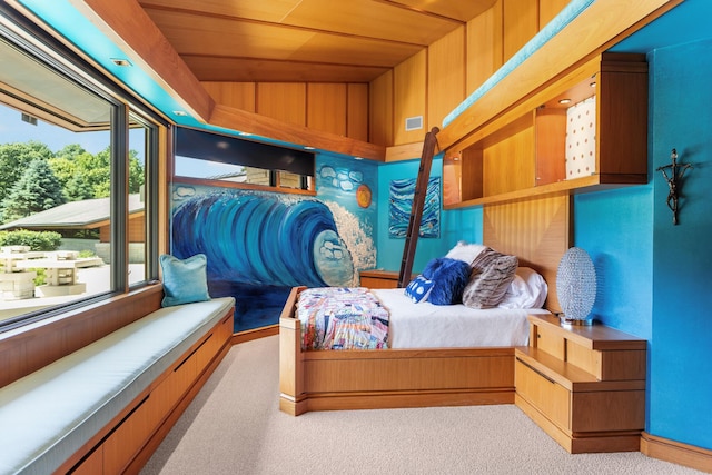 bedroom with lofted ceiling, wood ceiling, visible vents, and carpet