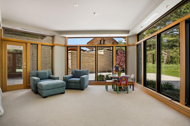 sunroom / solarium featuring plenty of natural light