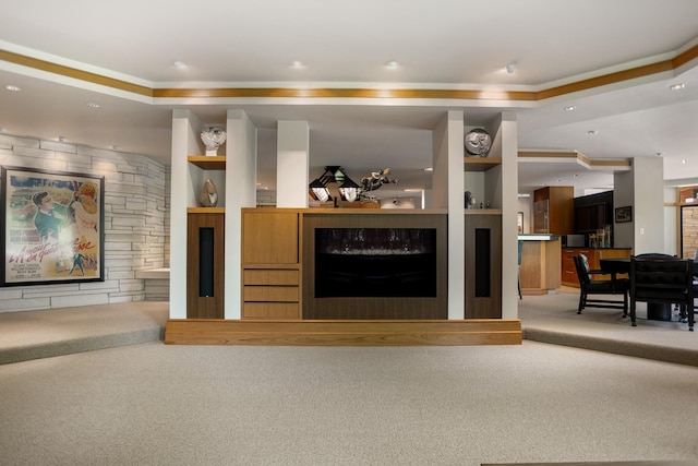 carpeted living room with a fireplace