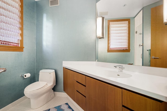 full bath featuring visible vents, toilet, tile patterned floors, vanity, and a shower stall