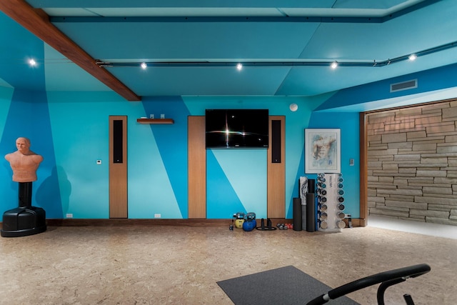 exercise room featuring visible vents