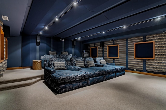 carpeted home theater featuring visible vents