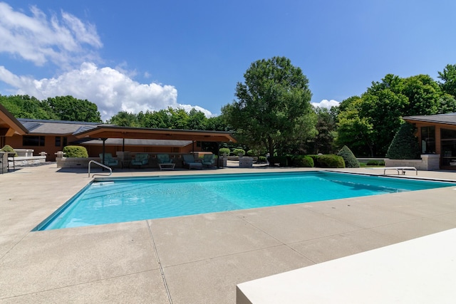 pool featuring a patio