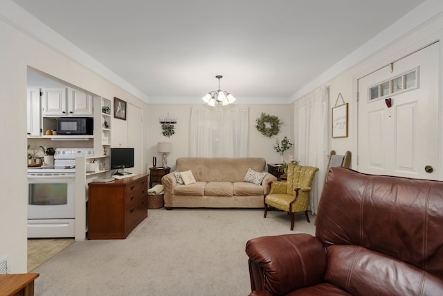 living room featuring an inviting chandelier, light colored carpet, and ornamental molding