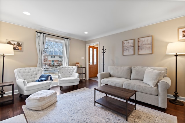 living area with recessed lighting, wood finished floors, and baseboards