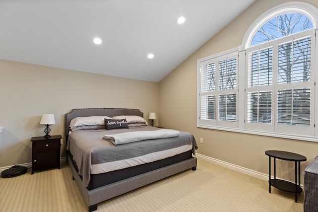 carpeted bedroom with lofted ceiling, baseboards, and recessed lighting