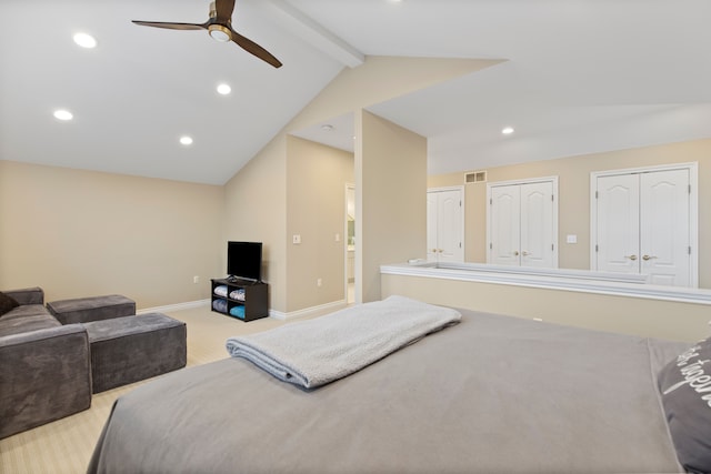 carpeted bedroom with vaulted ceiling with beams, recessed lighting, visible vents, baseboards, and ensuite bath