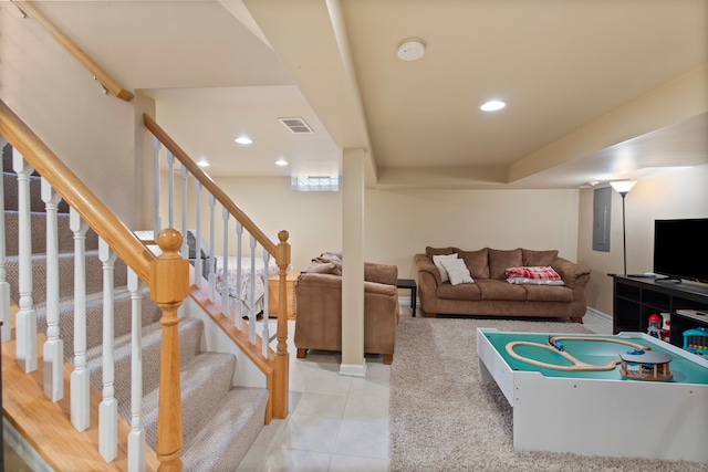 rec room featuring light tile patterned floors, electric panel, visible vents, and recessed lighting