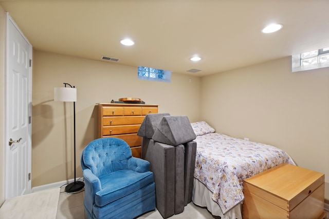 bedroom with light tile patterned floors, visible vents, and recessed lighting