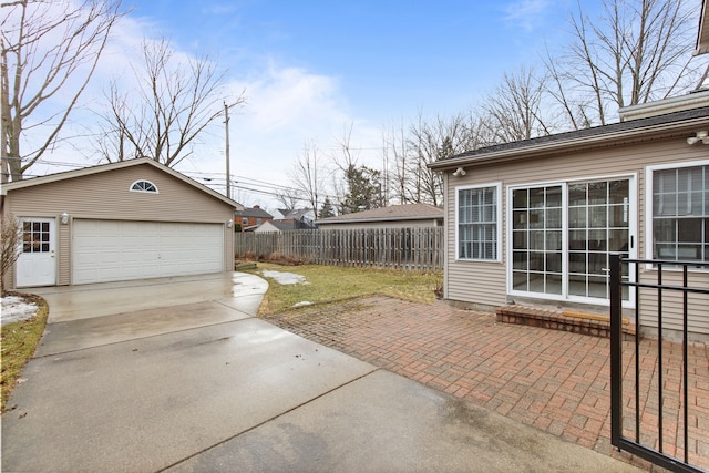 exterior space with fence and an outdoor structure