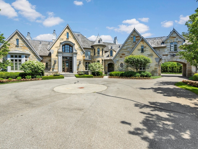 view of property featuring driveway