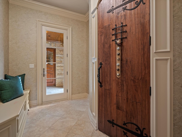 bathroom featuring baseboards, crown molding, and tile patterned floors