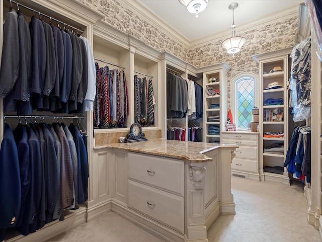 spacious closet with light carpet