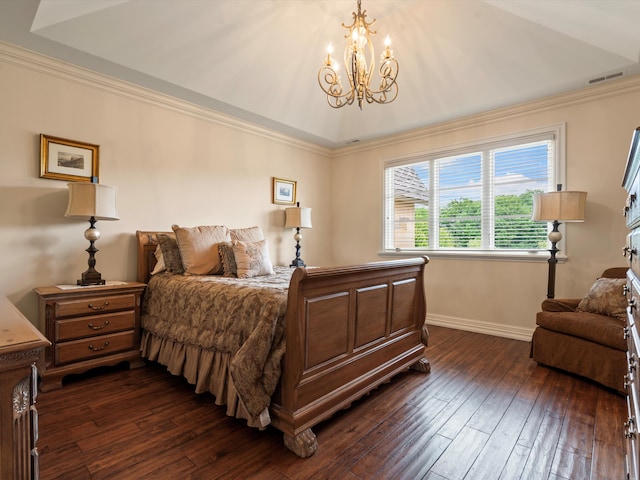 bedroom featuring baseboards, ornamental molding, dark wood-style flooring, and a notable chandelier