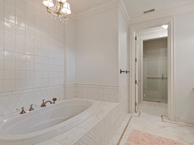 full bath featuring visible vents, ornamental molding, an inviting chandelier, a shower stall, and a bath