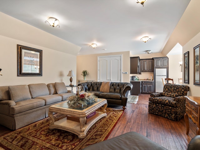 living area with dark wood-style flooring