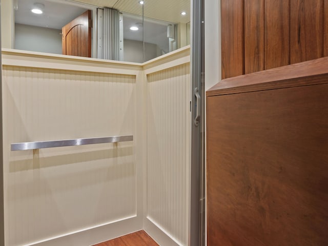 bathroom featuring wood finished floors